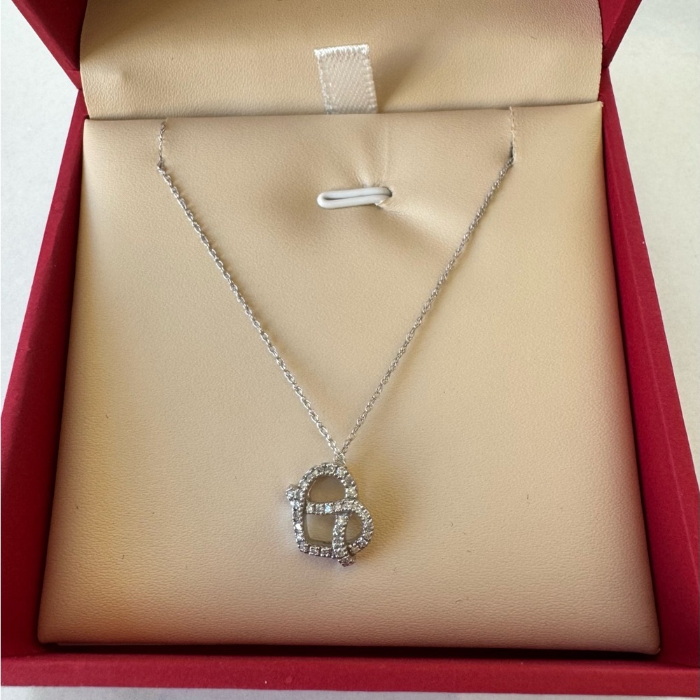 Elegant 14k White Gold Necklace with Diamond Paved Love Knot Pendant